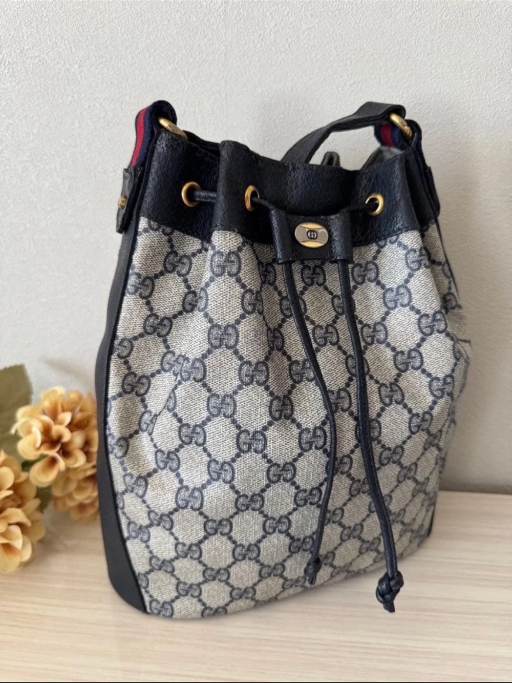 GG Monogram Drawstring Bucket Bag in Beige and Black - Gucci